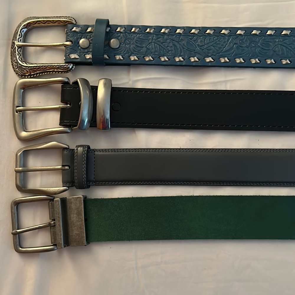 Four belts.  2 leather.  Various colors.  See pictures for measurements.